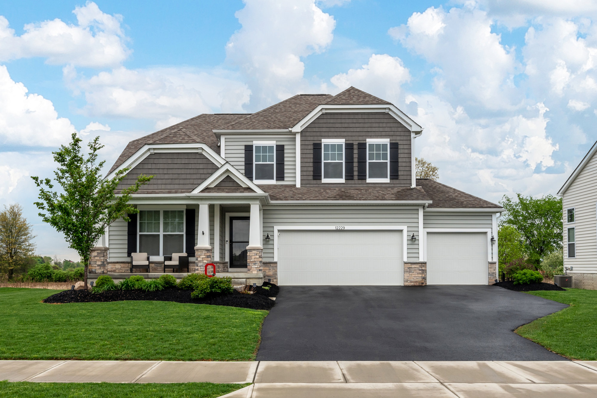 Front exterior of a home under a blue sky
