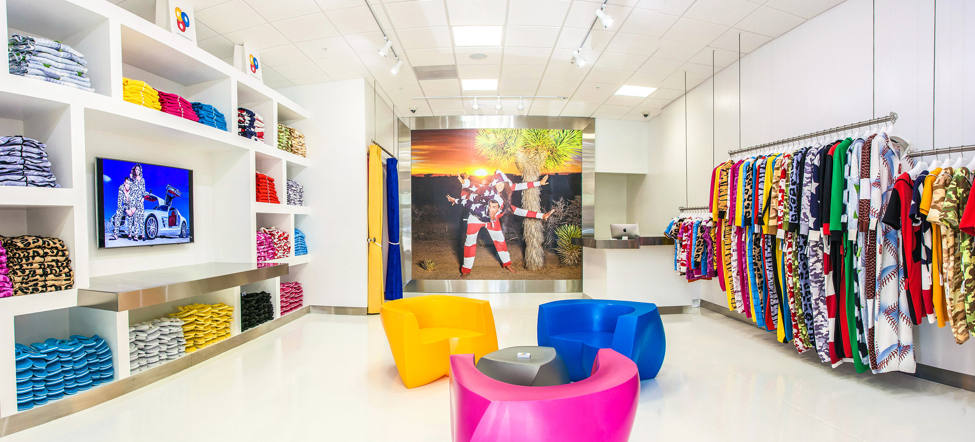 Colorful boutique interior with clothing racks and displays